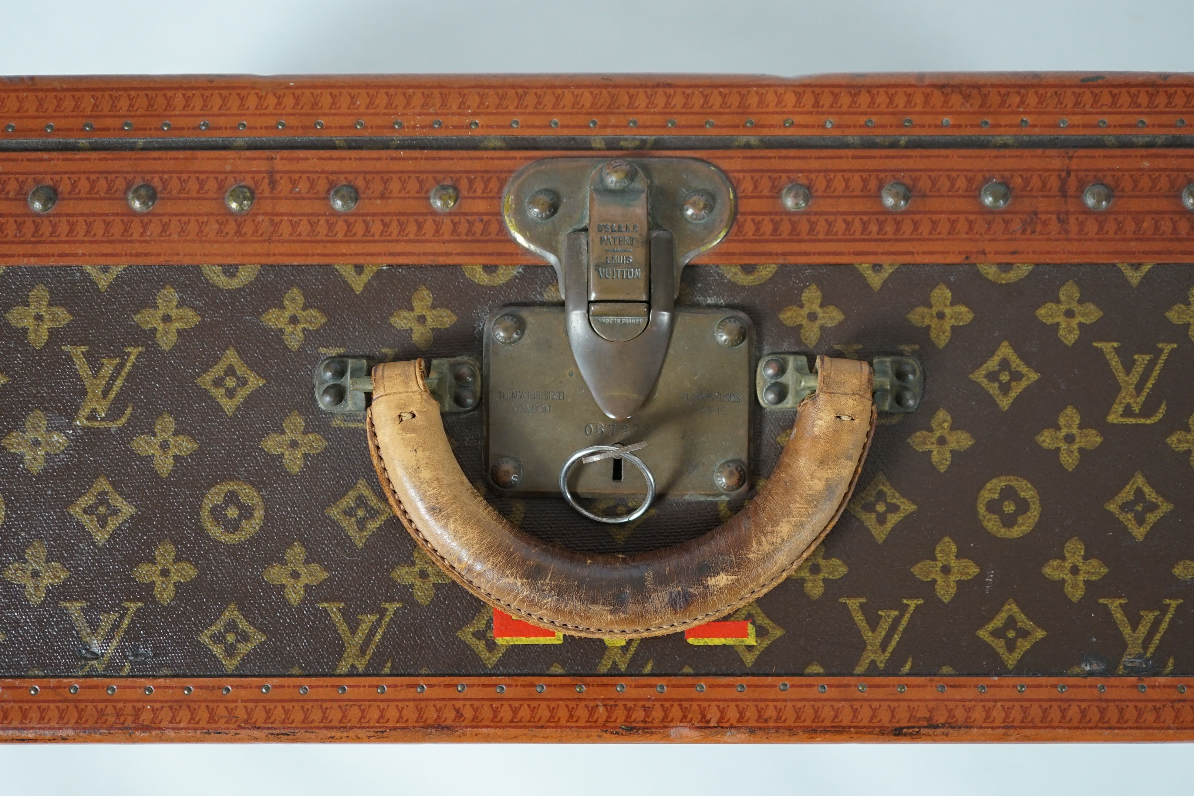 A vintage Louis Vuitton monogram canvas suitcase, 71cm x 44cm x 22cm